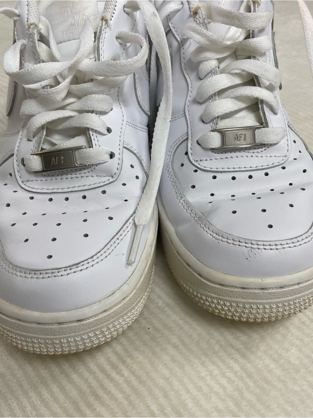 Women’s Nike White Leather Air Force 1 Sneakers